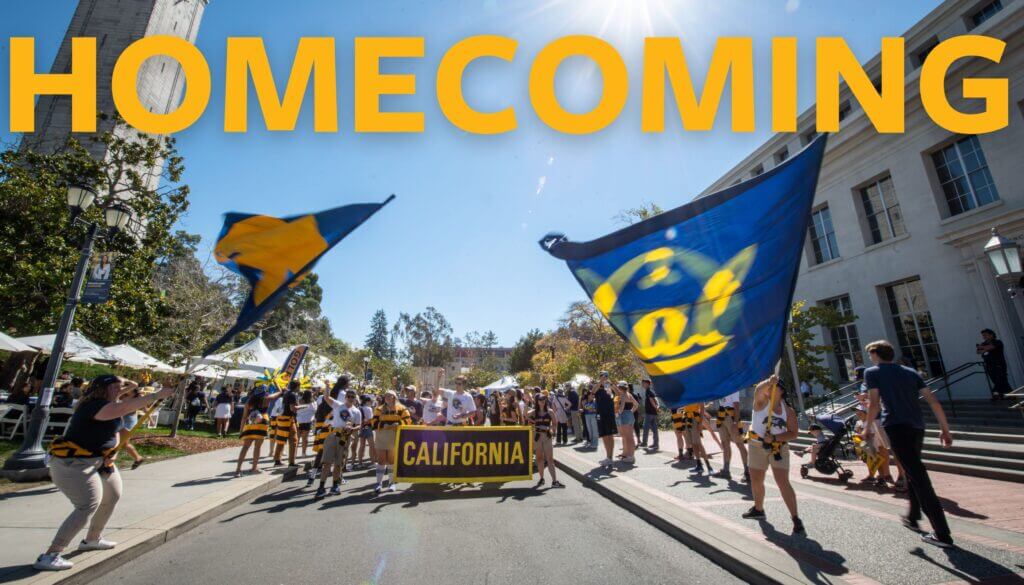 California homecoming parade with flags and banner.