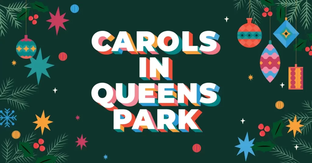 Festive carols event in Queens Park with decorations.