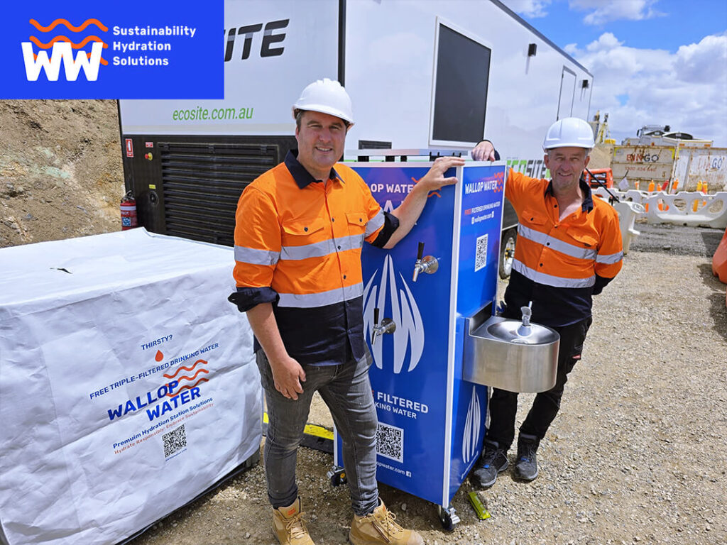 Ryan Tait and Bruce Plant, founders of Wallop Water with Monster Bar portable hydration station at M80 construction site.