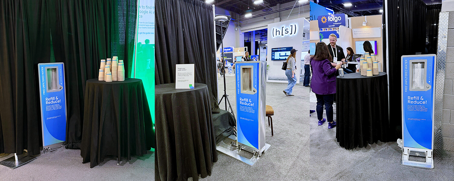 Exhibit with EVENTA custom-branded water refill stations and biodegradable cups.