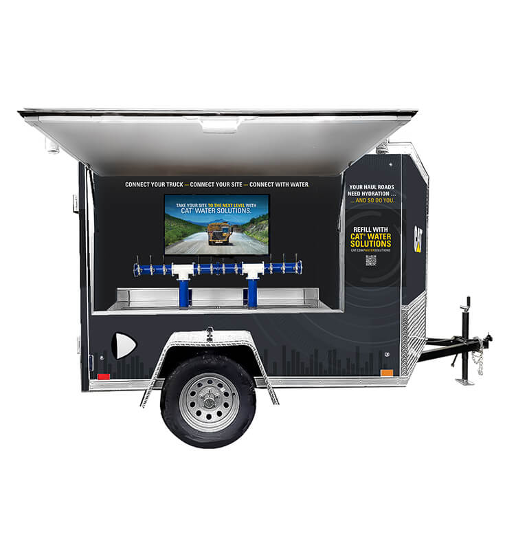 Mobile water solution trailer with taps and screen.