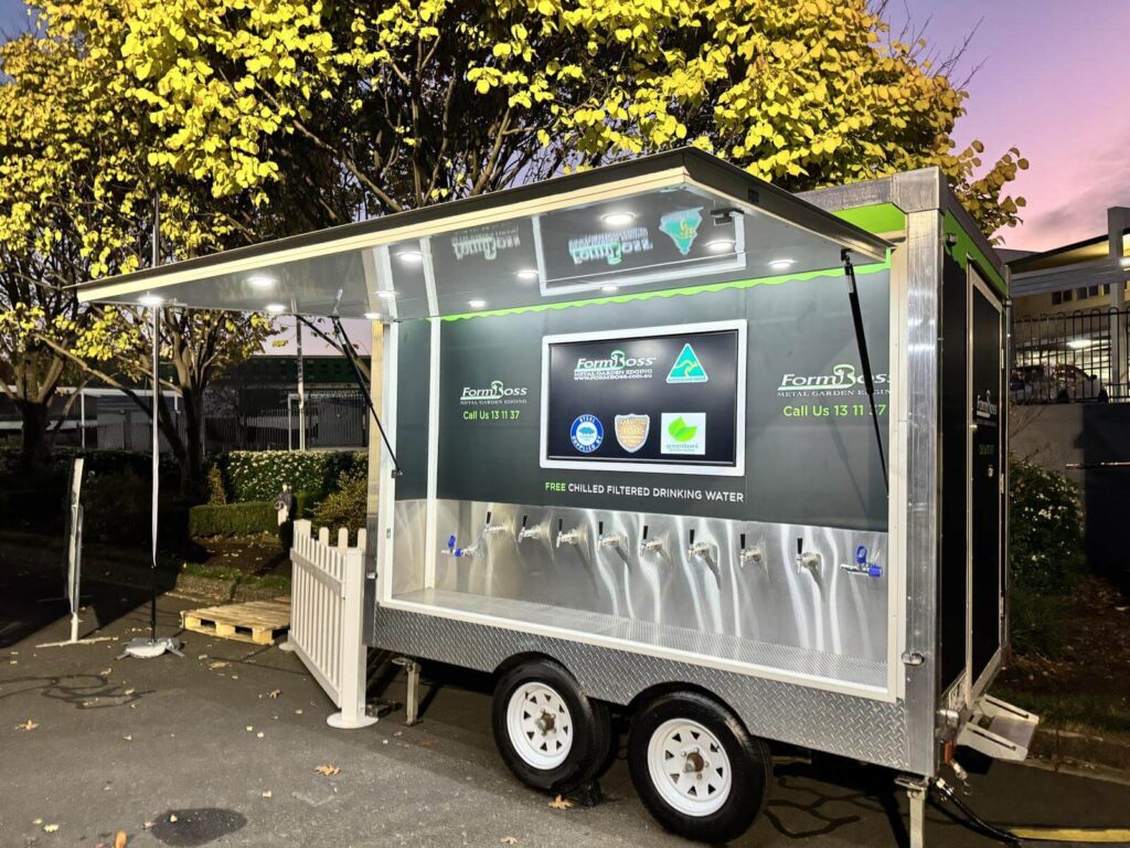 Mobile filtered drinking water station at evening.