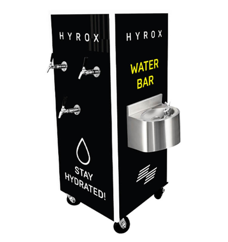 Black water fountain with HYROX and signage.