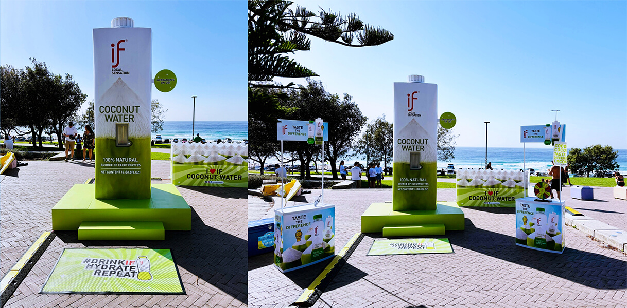Large If coconut water container near the Bondi beach.