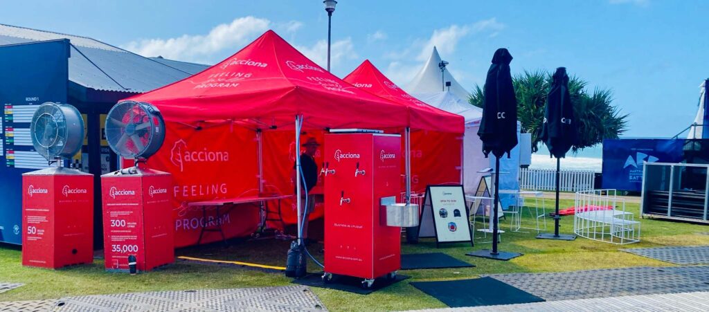 Red Acciona promotional tent setup outdoors