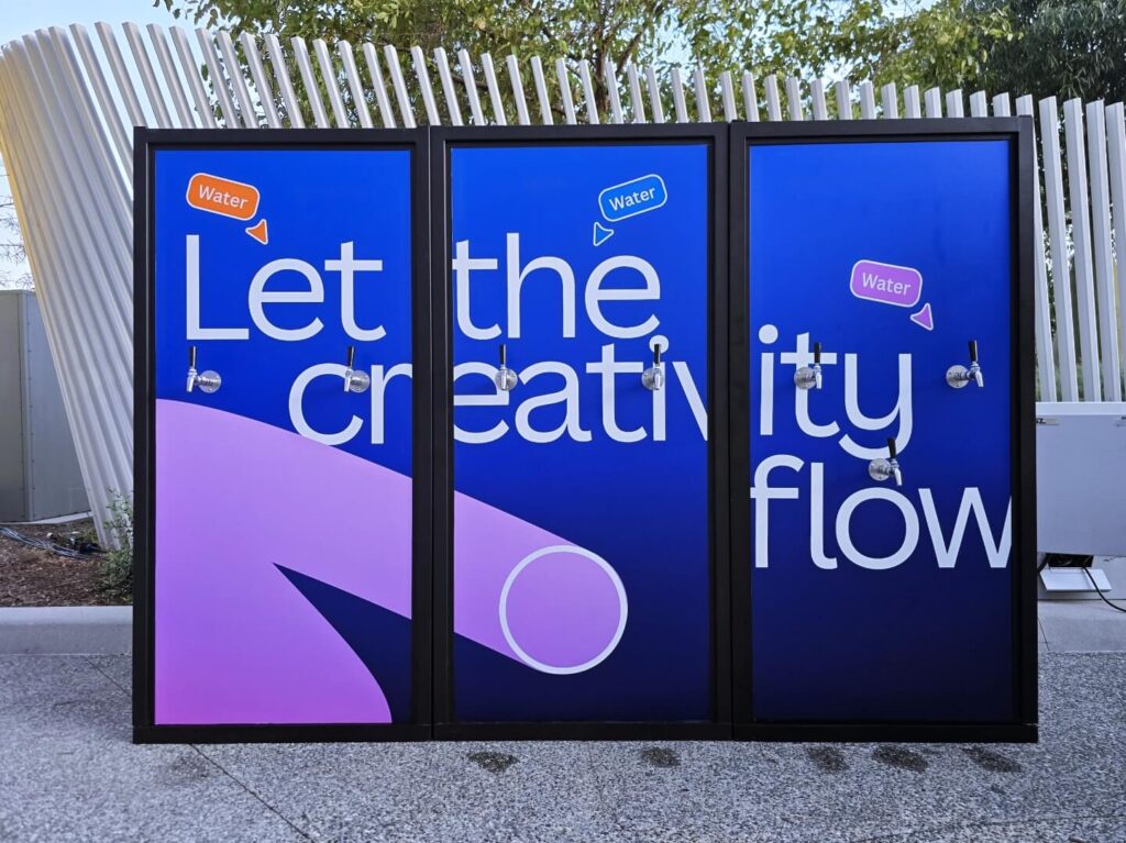Outdoor water taps on creative blue display panels