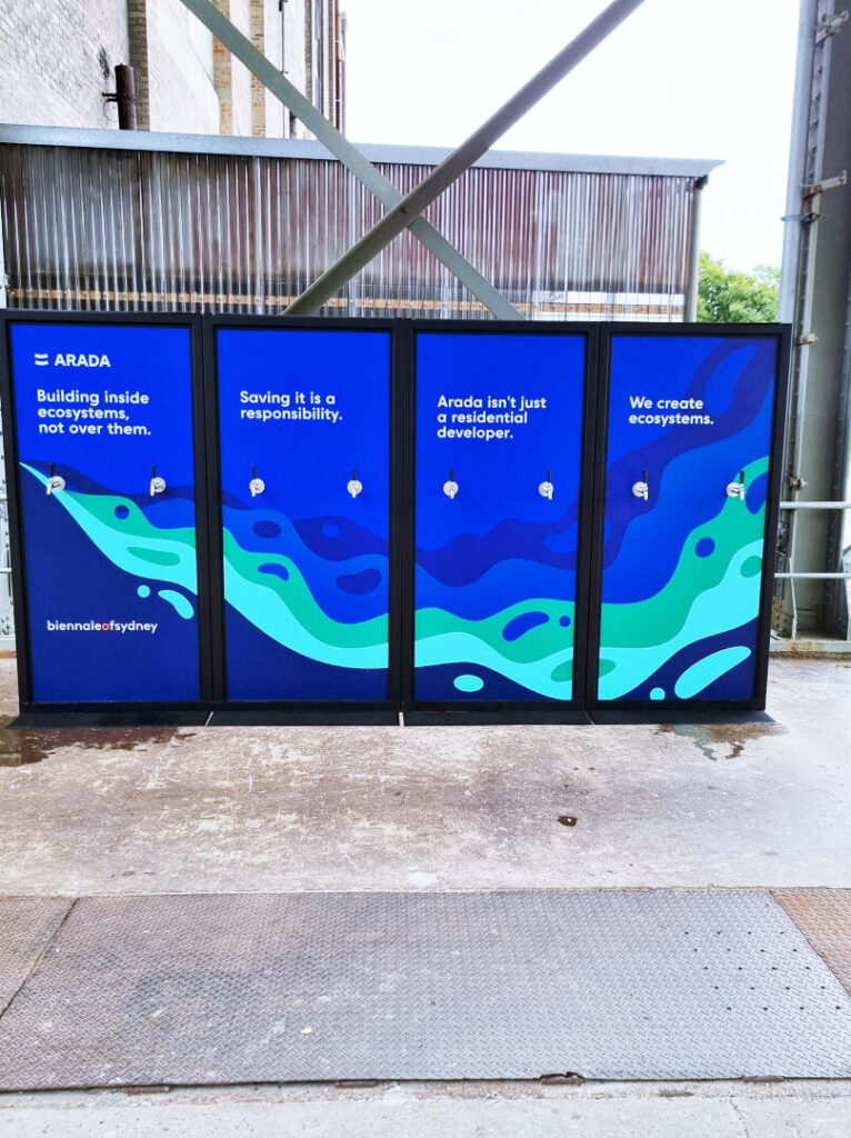 Blue ARADA promotional panels at Sydney event
