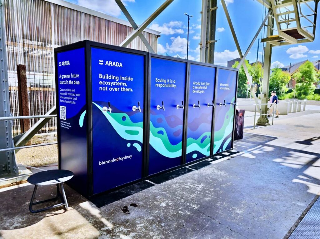 Branded water refill station at outdoor event